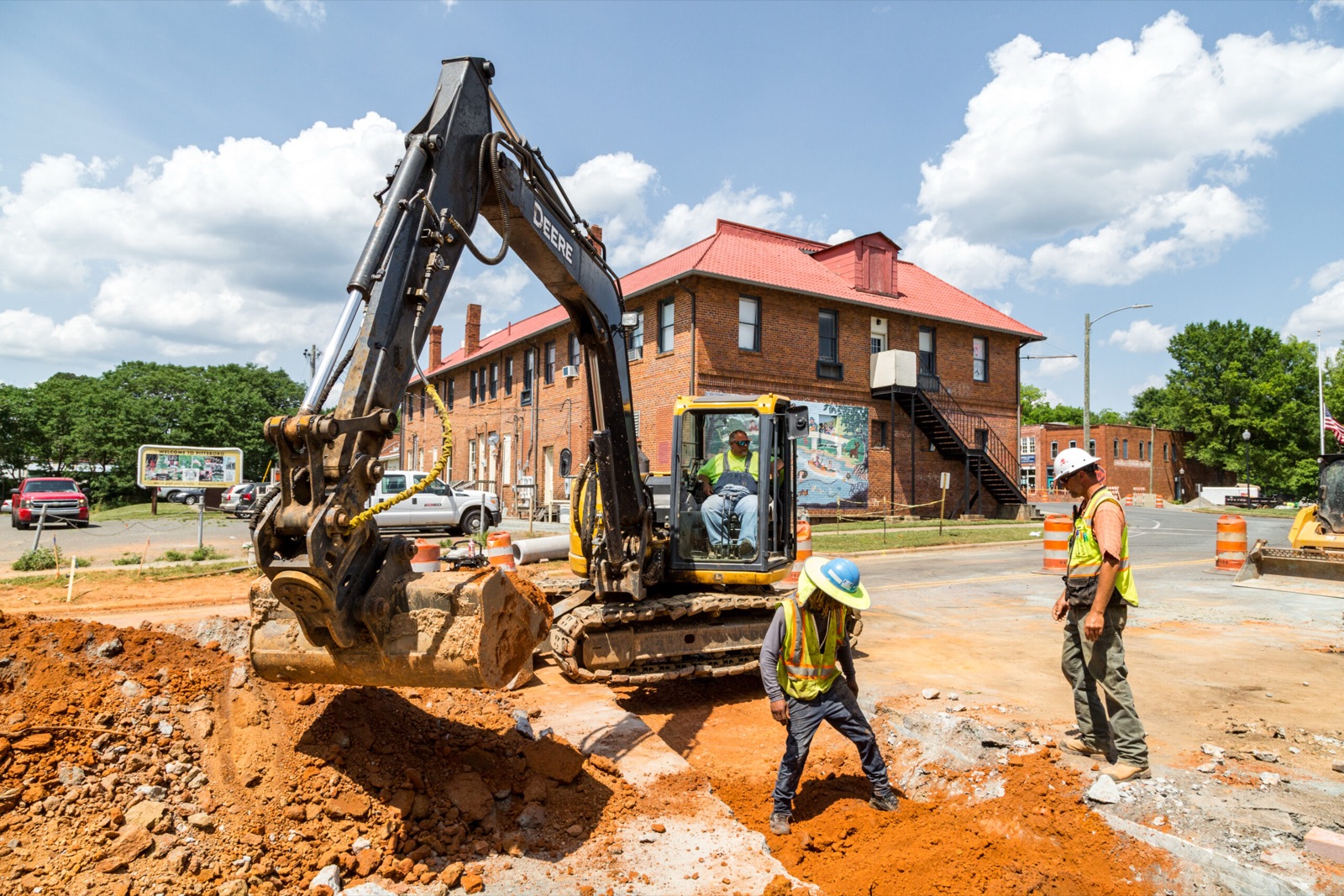 Sunrock crew and excavator rebuilding a downtown street